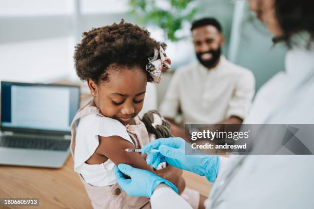 child being vaccinated - polio stock pictures, royalty-free photos & images