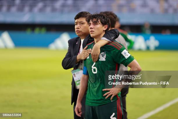 Isaac Martinez of Mexico reacts after after defeated by Mali during the FIFA U-17 World Cup Round of 16 match between Mali and Mexico at Gelora Bung...