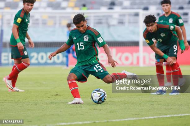 Luis Ortiz of Mexico shoots the ball during the FIFA U-17 World Cup Round of 16 match between Mali and Mexico at Gelora Bung Tomo Stadium on November...