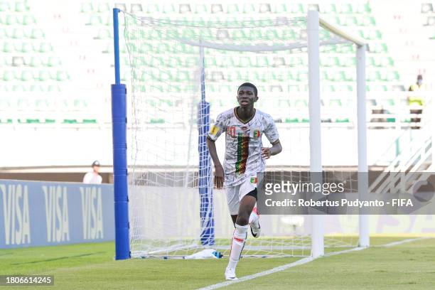 Ange Martial Tia of Mali celebrates after scoring during the FIFA U-17 World Cup Round of 16 match between Mali and Mexico at Gelora Bung Tomo...