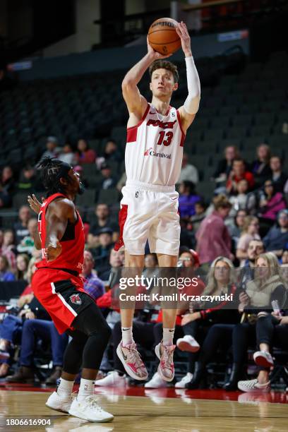 Drew Peterson of the Sioux Falls Skyforce shoots against Chris Clemons of the Windy City Bulls during the first half of an NBA G-League game on...