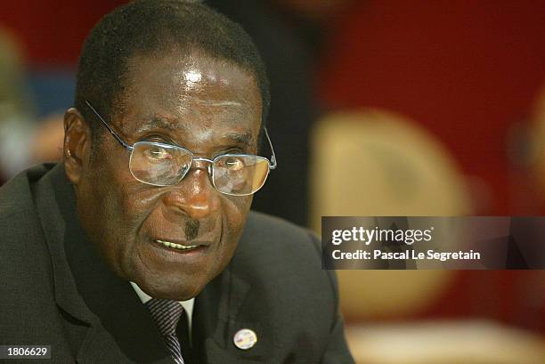 President of Zimbabwe Robert Mugabe in the 22nd African Heads of State Conference on February 21, 2003 in Paris, France. The Summit will focus on...