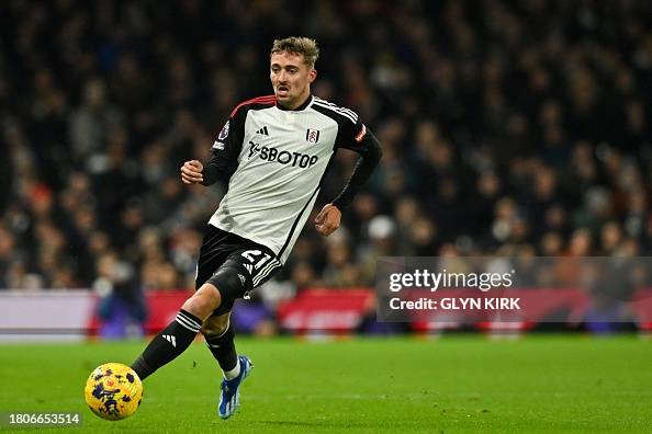 Fulham's Belgian defender Timothy Castagne controls the ball during ...