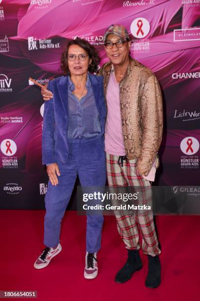 Ulrike Folkerts and Katharina Schnitzler attend the "Künstler Gegen Aids" Charity Gala at Theater des Westens on November 27, 2023 in Berlin, Germany.