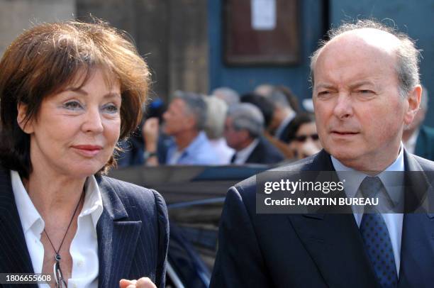 French former minister Jacques Toubon and wife Lise leave after a funeral mass for French actor Jean-Pierre Cassel at Saint-Eustache's church, 26...