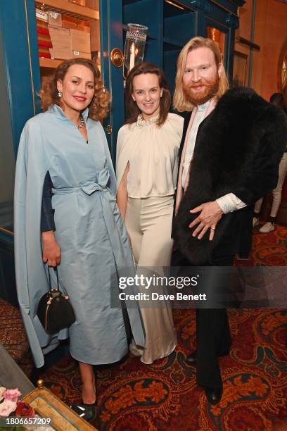 Lady Martha Sitwell, Charlotte Carroll and Henry Conway attend a party celebrating the exclusive launch of Celia Kritharioti at Harrods held at...