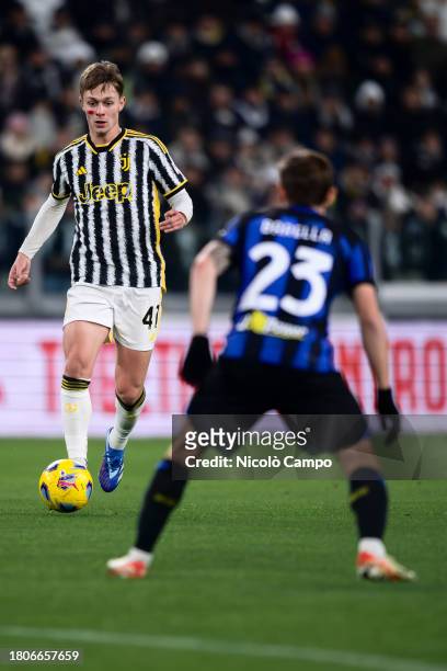Hans Nicolussi Caviglia of Juventus FC is challenged by Nicolo Barella of FC Internazionale during the Serie A football match between Juventus FC and...