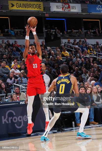 Toumani Camara of the Portland Trail Blazers shoots a three point basket during the game against the Indiana Pacers on November 27, 2023 at...