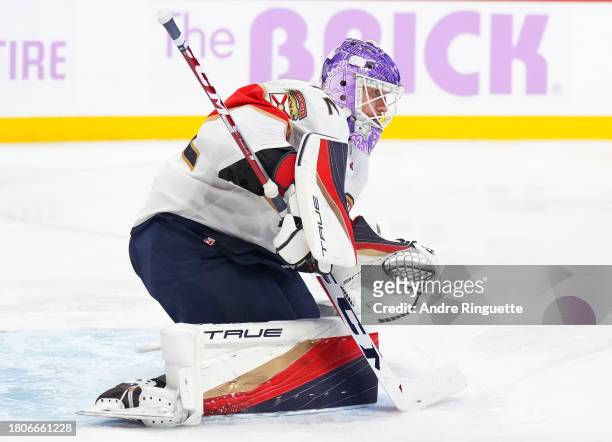 Sergei Bobrovsky of the Florida Panthers makes a save against the Ottawa Senators during the third period at Canadian Tire Centre on November 27,...