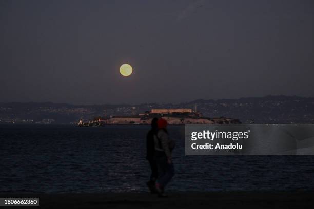 The Beaver Full Moon rises over Alcatraz Island in San Francisco, California, United States on November 27, 2023.