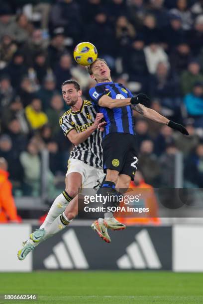Adrien Rabiot of Juventus and Nicolo Barella of Inter seen in action during the 2023-24 Serie A football match between Juventus and Inter at Allianz...