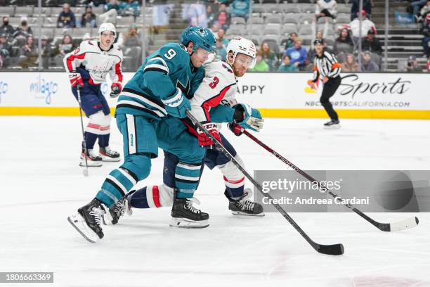 November 24: Jacob MacDonald of the San Jose Sharks skating with the puck against the Washington Capitals at SAP Center on November 27, 2023 in San...