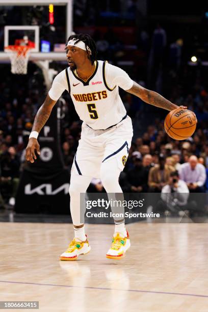 Denver Nuggets guard Kentavious Caldwell-Pope dribbles during an NBA basketball game against the LA Clippers on November 27, 2023 at Crypto.com Arena...