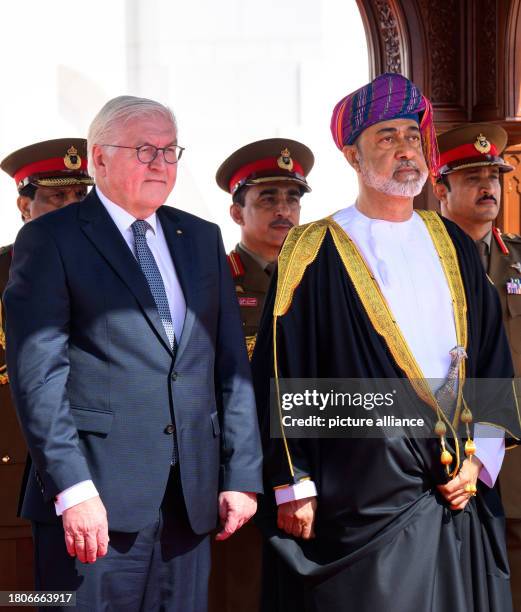 November 2023, Oman, Maskat: Haitham bin Tariq bin Taimur al-Said, Sultan of Oman, welcomes Federal President Frank-Walter Steinmeier with military...