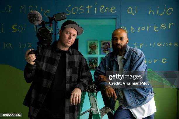 Kendrick Hopkins, a documentary film producer, left, and Asa Jackson, curator and director of the Contemporary Arts Network, pose together for a...