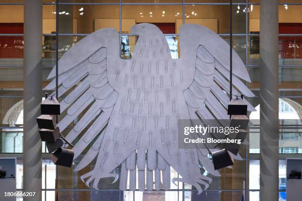 The Bundestag Federal Eagle symbol, ahead of an address by Olaf Scholz, Germany's chancellor, on the Federal Constitutional Court's ruling on the 60...