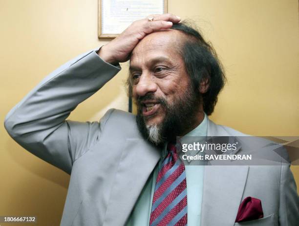 Chairman of the Intergovernmental Panel on Climate Change Rajendra Pachauri gestures after winning the Nobel Peace Prize in New Delhi, 12 October...