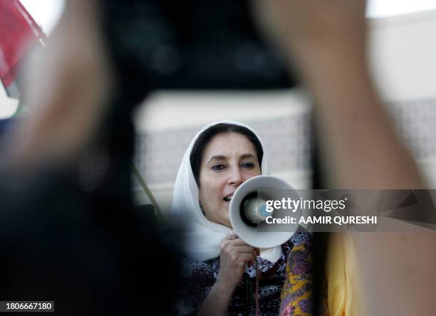 Pakistani former premier Benazir Bhutto addresses supporters at the Sukkur airport, some 600 kms north of Karachi, 29 October 2007. Bhutto wrapped up...