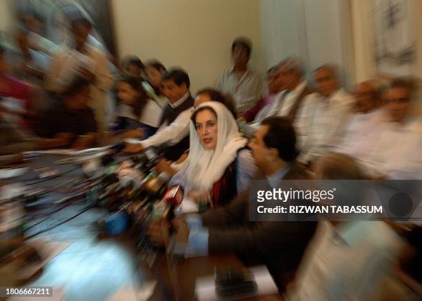 Pakistani former premier Benazir Bhutto addresses a press conference along with party leaders in Karachi, 31 October 2007. Bhutto said that she had...