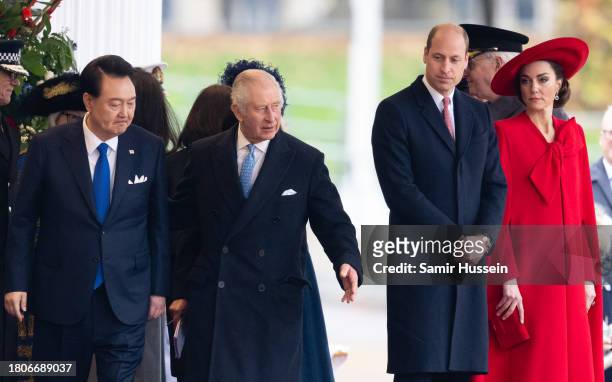 President of South Korea, Yoon Suk Yeol, King Charles III, Prince William, Prince of Wales and Catherine, Princess of Wales attend a ceremonial...