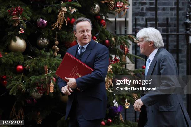 Foreign Secretary David Cameron and Minister of State, Andrew Mitchell, leave 10 Downing Street following the Weekly Cabinet Meeting on November 28,...