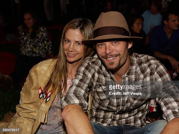 Mira Sorvino and Chris Backus attend Eddie Vedder and Zach Galifianakis Rock Malibu Fundraiser for EBMRF and Heal EB on September 15, 2013 in Malibu,...
