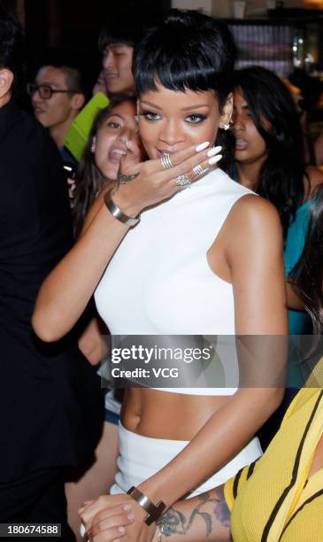 Rihanna attends M.A.C store opening ceremony at Elements shopping mall on September 15, 2013 in Hong Kong, Hong Kong.