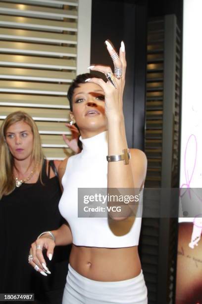 Rihanna attends M.A.C store opening ceremony at Elements shopping mall on September 15, 2013 in Hong Kong, Hong Kong.