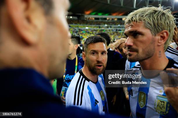 Lionel Messi of Argentina talks to teammates as as the match was delayed due to incidents in the stands during a FIFA World Cup 2026 Qualifier match...