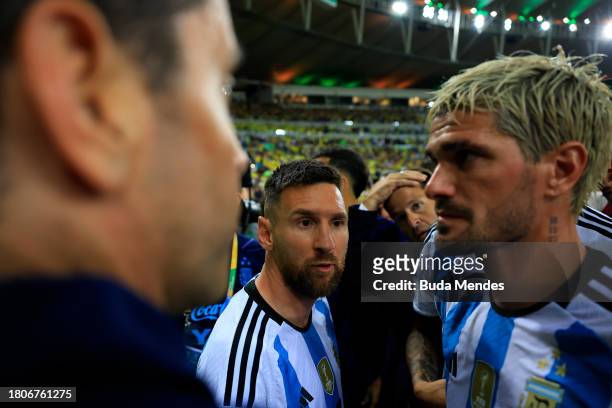 Lionel Messi of Argentina talks to teammates as as the match was delayed due to incidents in the stands during a FIFA World Cup 2026 Qualifier match...