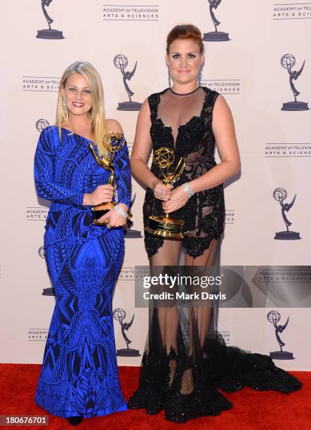 Marina Toybina and Courtney Webster pose with the award for outstanding costumes for a variety program or a special for the "55th Annual Grammy...