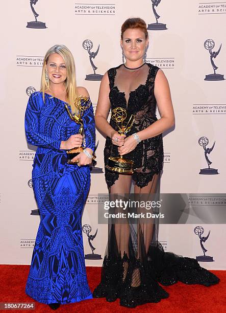 Marina Toybina and Courtney Webster pose with the award for outstanding costumes for a variety program or a special for the "55th Annual Grammy...