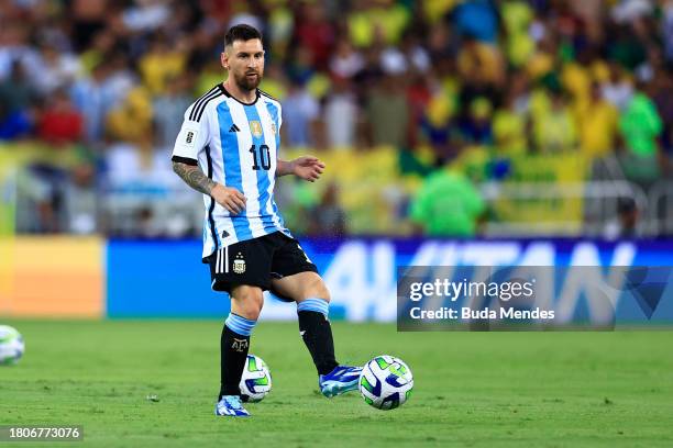 Lionel Messi of Argentina warms up after the match was delayed due to incidents in the stands prior to a FIFA World Cup 2026 Qualifier match between...