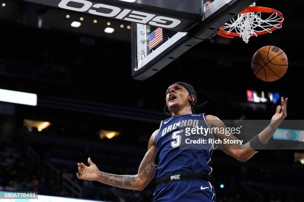 Paolo Banchero of the Orlando Magic dunks the ball against the Toronto Raptors during the first quarter of the In-Season NBA Tournament game at Amway...