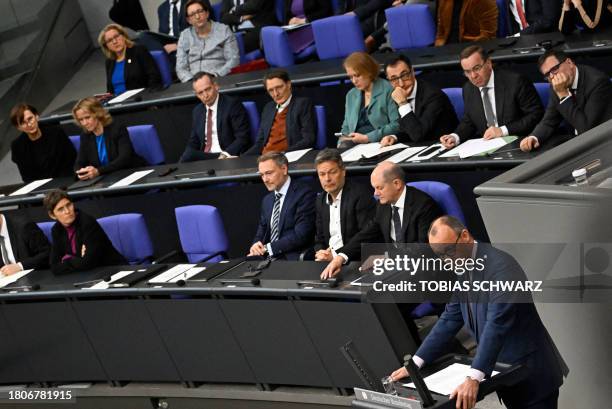 The chairman of Germany's conservative Christian Democratic Union party and opposision leader Friedrich Merz speaks during a session at the Bundestag...