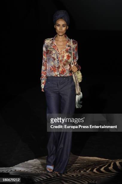 Model showcases designs by Roberto Verino on the runway at Roberto Verino show during Mercedes Benz Fashion Week Madrid Spring/Summer 2014 at Ifema...