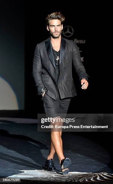 Jon Kortajarena showcases designs by Roberto Verino on the runway at Roberto Verino show during Mercedes Benz Fashion Week Madrid Spring/Summer 2014...