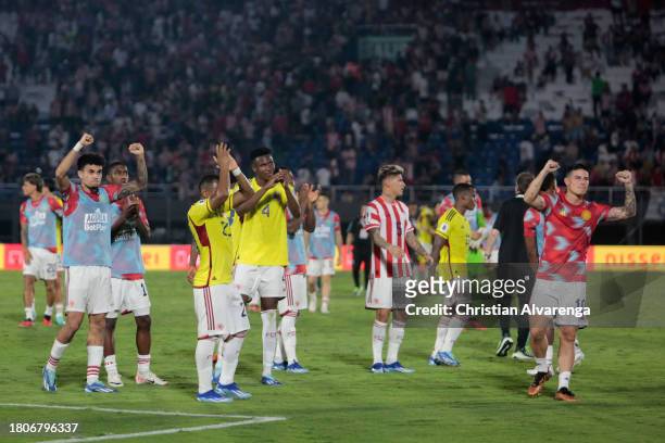 Luis Diaz of Colombia , James Rodriguez of Colombia and teammates great fans after a FIFA World Cup 2026 Qualifier match between Paraguay and...