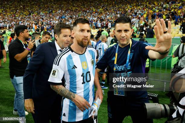 Lionel Messi of Argentina reacts as the match is delayed due to incidents in the stands prior to a FIFA World Cup 2026 Qualifier match between Brazil...