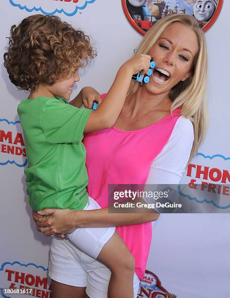 Personality Kendra Wilkinson and son Hank Baskett arrive at the Los Angeles premiere of "Thomas & Friends: King Of The Railway - The Movie" at...