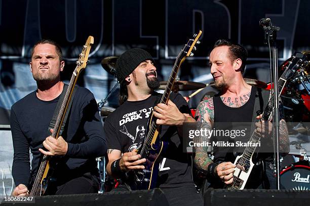 Bassist Anders Kj¿lholm, guitarist Rob Caggiano and vocalist Michael Poulsen of Volbeat perform in Monster Energy's Aftershock Festival at Discovery...