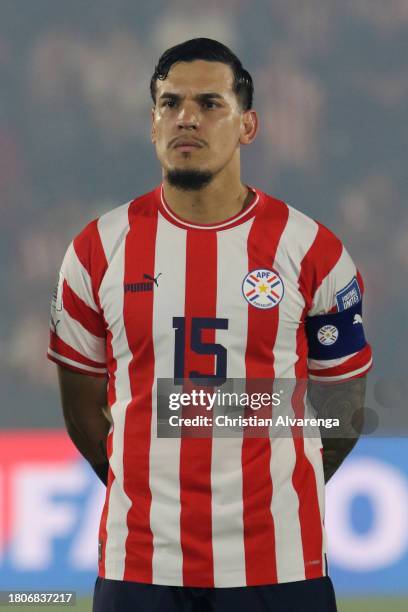 Gustavo Gomez of Paraguay stands during the national anthem prior a FIFA World Cup 2026 Qualifier match between Paraguay and Colombia at Estadio...