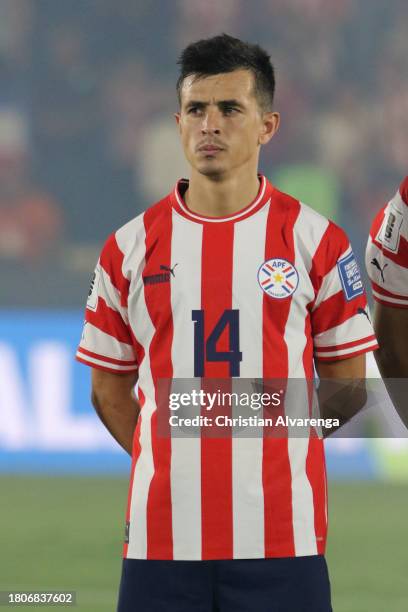 Andres Cubas of Paraguay stands during the national anthem prior a FIFA World Cup 2026 Qualifier match between Paraguay and Colombia at Estadio...