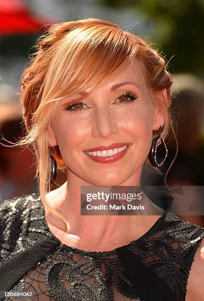 Television host Kari Byron poses at the 2013 Creative Arts Emmy Awards held at the Nokia Theatre L.A. Live on September 15, 2013 in Los Angeles,...