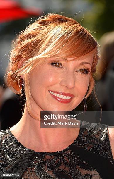 Television host Kari Byron poses at the 2013 Creative Arts Emmy Awards held at the Nokia Theatre L.A. Live on September 15, 2013 in Los Angeles,...