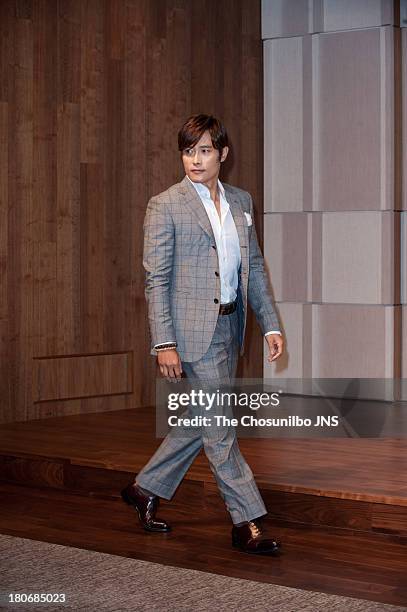 Lee Byung-Hun attends the Bae Soo-Bin Wedding at the Shilla hotel on September 14, 2013 in Seoul, South Korea.