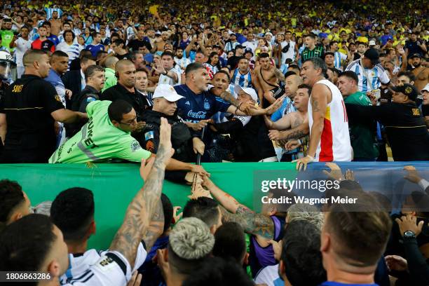 Players of Argentina react as police officers clash with fans prior to a FIFA World Cup 2026 Qualifier match between Brazil and Argentina at Maracana...