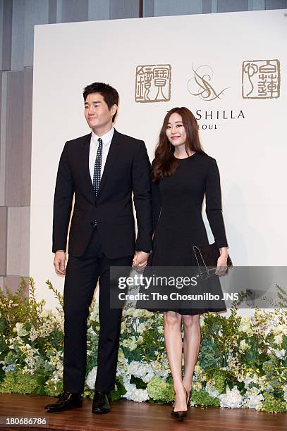 Yoo Ji-Tae and Kim Hyo-Jin attend the Bae Soo-Bin Wedding at the Shilla hotel on September 14, 2013 in Seoul, South Korea.