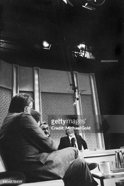 Actor, Writer, Buck Henry, and Comedian, substitute host, David Steinberg for the Tonight Show with Johnny Carson having a discussion at Mr. Carson's...