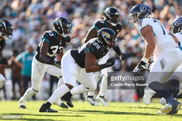 Jeremiah Ledbetter of the Jacksonville Jaguars rushes the passer during an NFL football game against the Tennessee Titans at EverBank Stadium on...